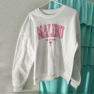 white malibu sweatshirt pink letters